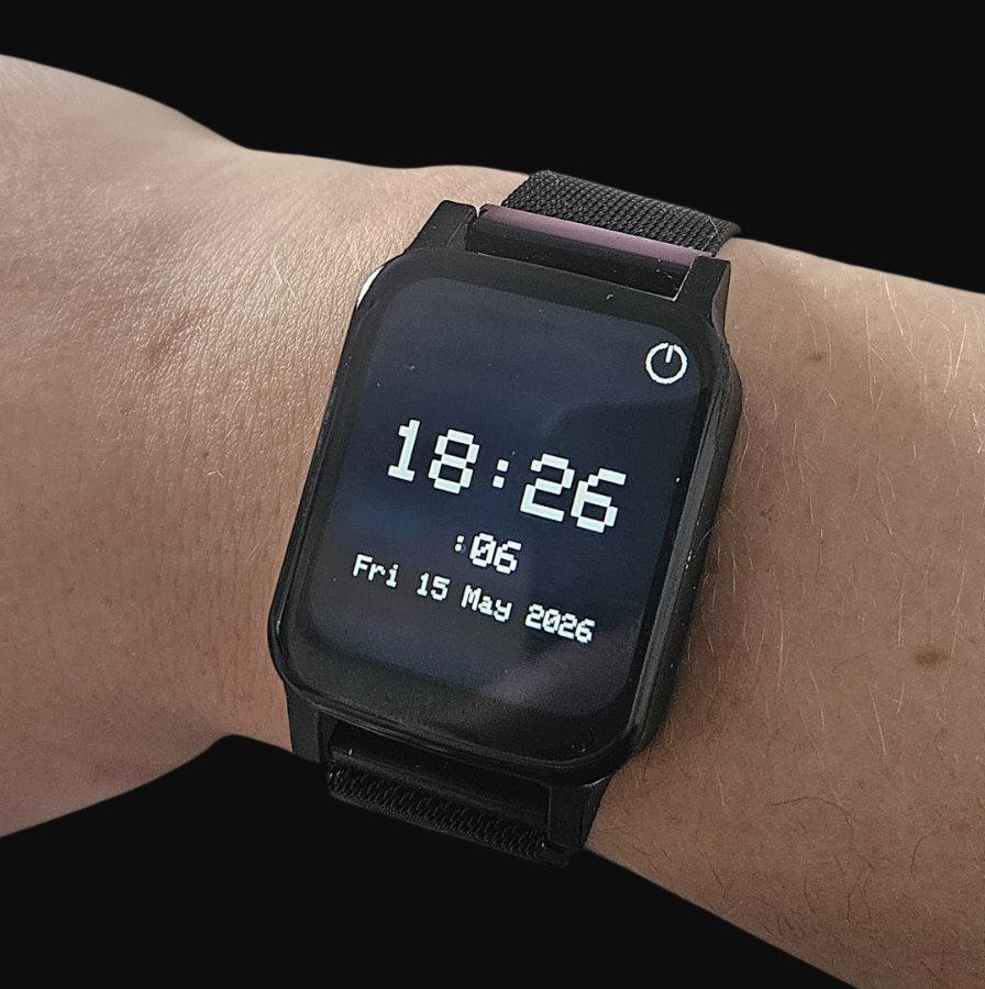 EWatch on the wrist, showing the clock face